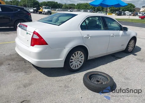 2011 Ford Fusion Hybrid from USA, damaged, VIN 3FADP0L34BR254595